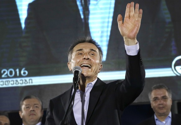 FILE - Georgian businessman Bidzina Ivanishvili greets supporters during a rally in Tbilisi, Georgia, Oct. 8, 2016. A Singapore court ruled Friday, May 26, 2023, that Credit Suisse owes billionaire an ...