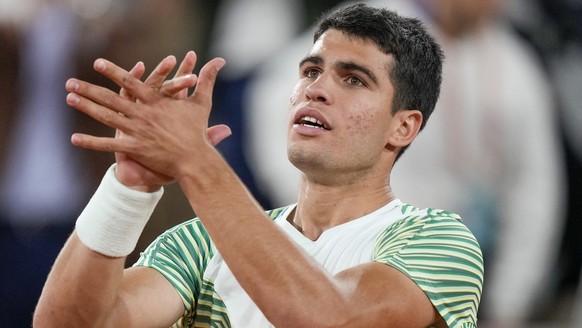 Spain&#039;s Carlos Alcaraz celebrates winning his quarterfinal match of the French Open tennis tournament against Greece&#039;s Stefanos Tsitsipas in three sets, 6-2, 6-1, 7-6 (7-5), at the Roland Ga ...