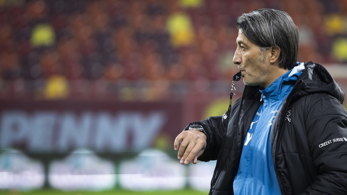 Switzerland's head coach Murat Yakin blows his whistle during a training session one day before the UEFA Euro 2024 qualifying group I soccer match between Romania and Switzerland at the National ...