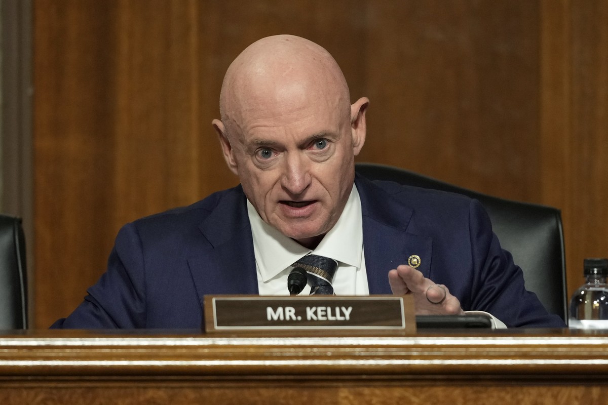 Sen. Mark Kelly, D-Ariz., speaks during the Senate Armed Services Committee confirmation hearing for Pete Hegseth, President-elect Donald Trump's choice to be Defense secretary, at the Capitol in ...