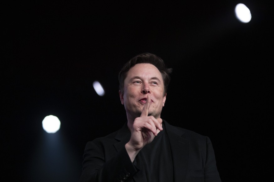 FILE- In this March 14, 2019, file photo Tesla CEO Elon Musk speaks before unveiling the Model Y at Tesla&#039;s design studio in Hawthorne, Calif. Musk is taking on the workhorse heavy pickup truck m ...