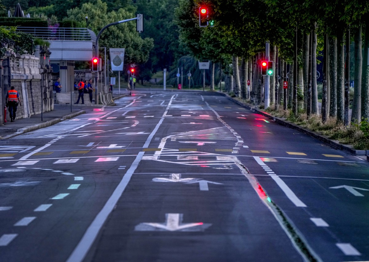 APTOPIX Swiss police forces have blocked a road that will be taken by U.S. President Joe Biden and Russia's President Vladimir Putin in Geneva, Switzerland, early Wednesday, June 16, 2021. Biden  ...