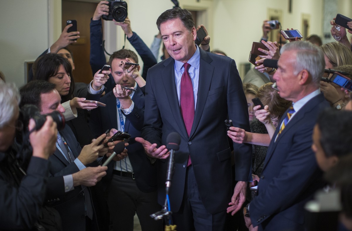 epa07248891 YEARENDER DECEMBER 2018

Former FBI Director James Comey (C) speaks to the news media after a daylong closed door hearing for the House of Representatives Judiciary Committee at the US C ...