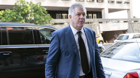 Attorney M. Evan Corcoran arrives in federal court in Washington, July 22, 2022. Justice Department prosecutors are investigating the mishandling of classified documents in the est...