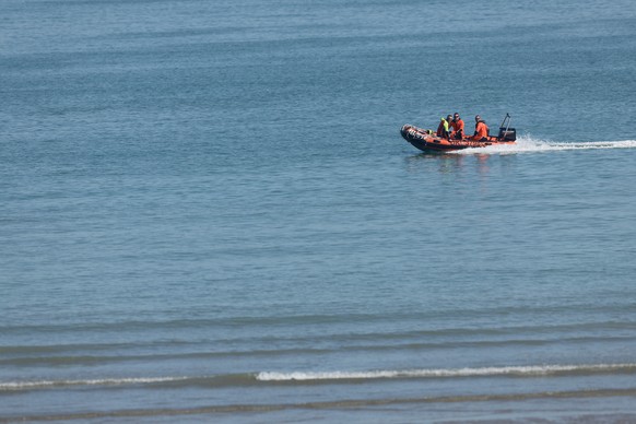 An SNSM lifeboat, operated by the volunteer sea rescue organization heavily involved in rescuing migrants attempting to cross the English Channel from France to Britain, patrols near Dunkirk, France,  ...