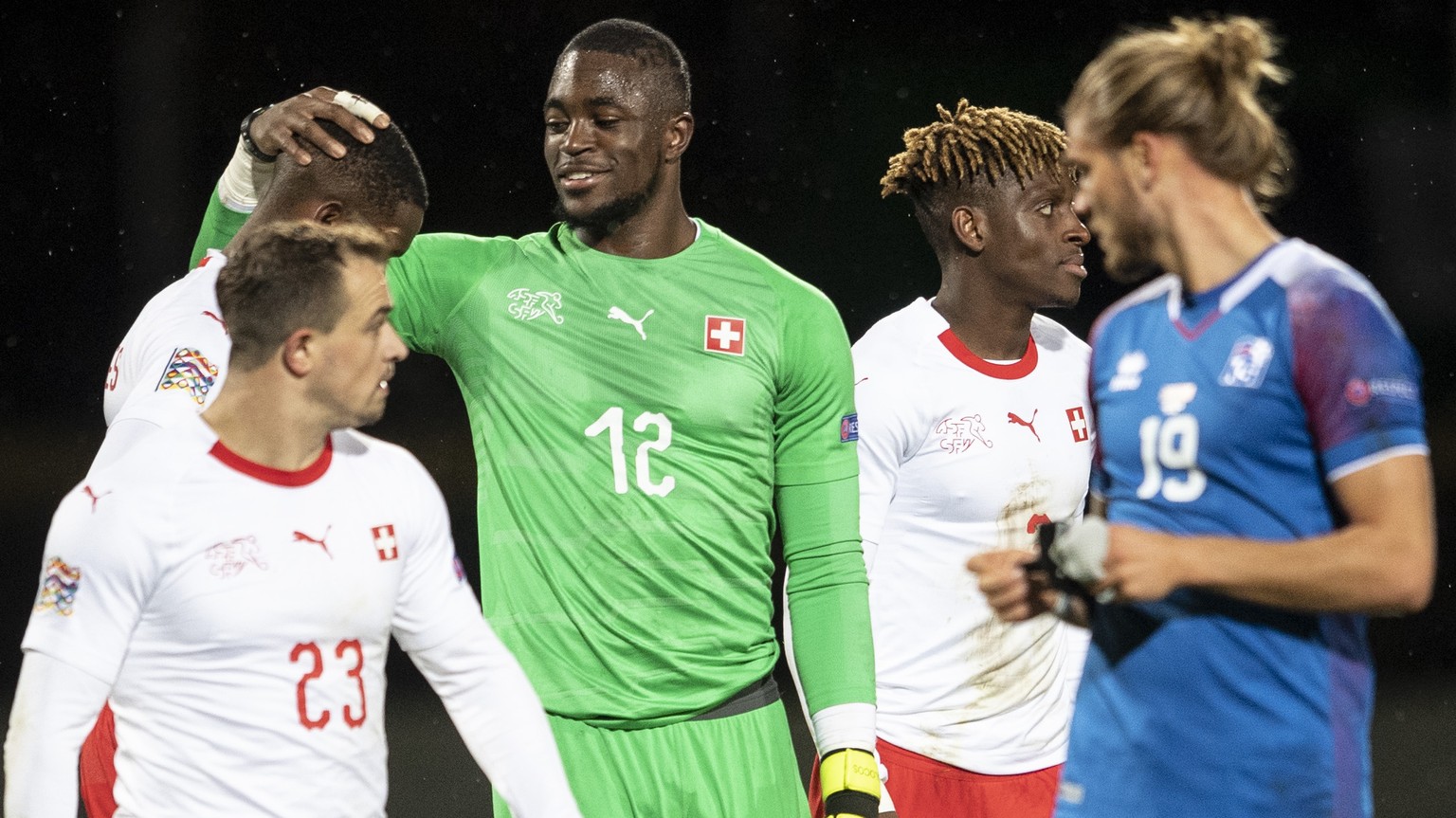 Switzerland&#039;s goalkeeper Yvon Mvogo, center, reacts after the UEFA Nations League soccer match between Iceland and Switzerland at the Laugardalsvoellur stadium in Reykjavik, Iceland, on Monday, O ...