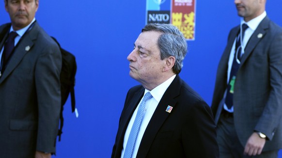 FILE - Italian Prime Minister Mario Draghi, center, arrives for the NATO summit in Madrid, Spain on Wednesday, June 29, 2022. Italian Prime Minister Mario Draghi&#039;s offer to resign has sent unsett ...