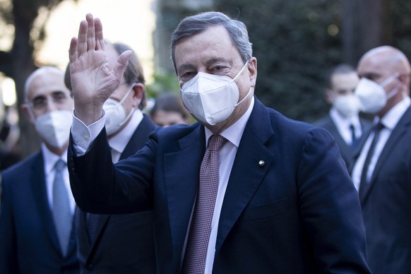 epa09046677 Italian Prime Minister Mario Draghi (C), arrives at Palazzo Borromeo for the 92th anniversary of Lateran Treaty, in Rome, Italy, 02 March 2021. EPA/ANSA/MASSIMO PERCOSSI