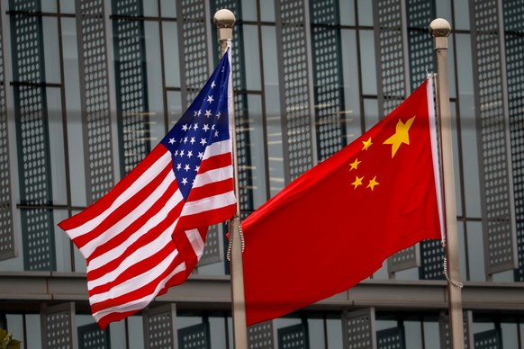 epa10975947 The flags of the US and China fly in Beijing, China, November 15, 2023. Chinese President Xi Jinping will meet US President Joe Biden on November 15 during the Asia-Pacific Economic...
