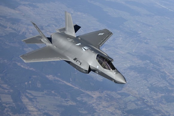 In this image provided by the U.S. Air Force, a U.S. Air Force F-35 Lightning II aircraft assigned to the 34th Fighter Squadron, departs from a KC-10 Extender aircraft after receiving fuel over Poland ...