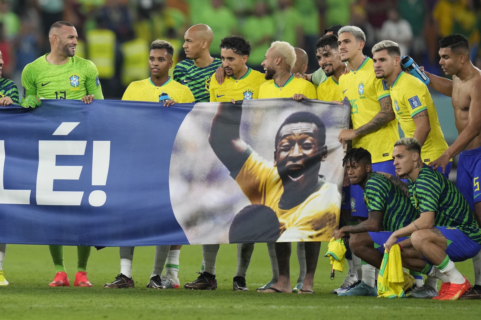 Brazil&#039;s players shows a banner in support of Brazilian soccer legend Pele at the end of the World Cup round of 16 soccer match between Brazil and South Korea, at the Stadium 974 in Doha, Qatar,  ...