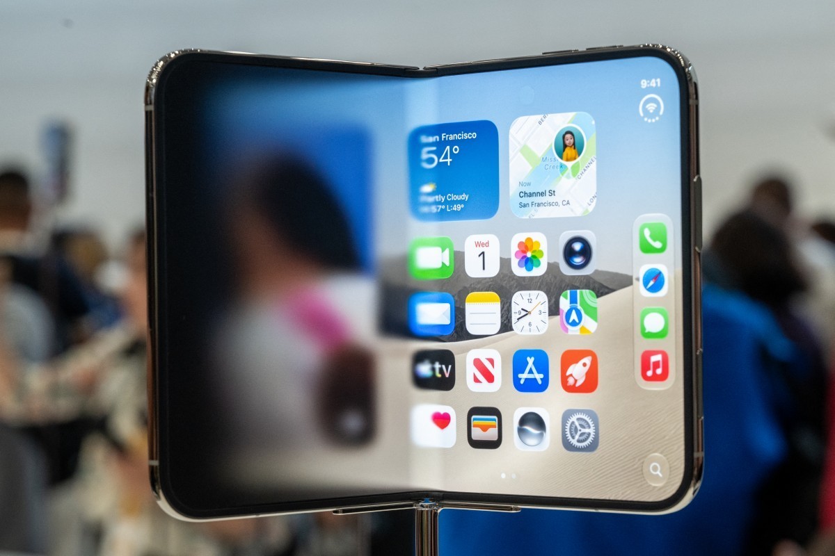 The new foldable iPhone Duo is displayed during an Apple event at the Steve Jobs Theater in Apple Park in Cupertino, California, on September 9, 2026. Apple unveiled its long-awaited first foldable sm ...