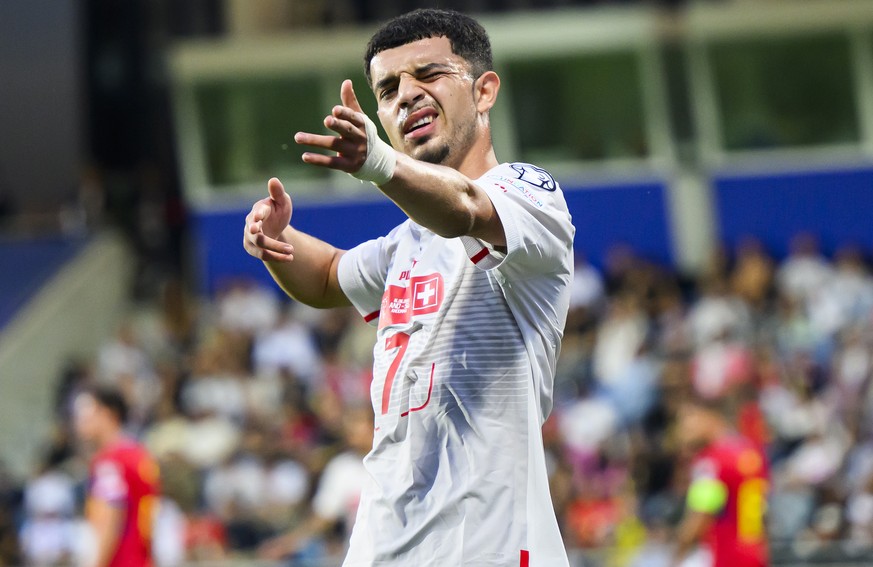 epa10695698 Switzerland&#039;s forward Zeki Amdouni celebrates his goal after scoring the 0-2 during the UEFA Euro 2024 qualifying soccer match between Andorra and Switzerland at the Estadi Nacional s ...