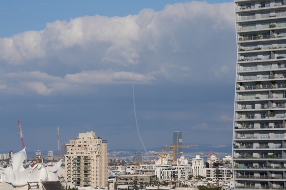 The trace of an air defense missile interception is seen over Tel Aviv, Israel, Saturday, Feb. 28, 2026. (AP Photo/Ohad Zwigenberg)
Israel US Iran