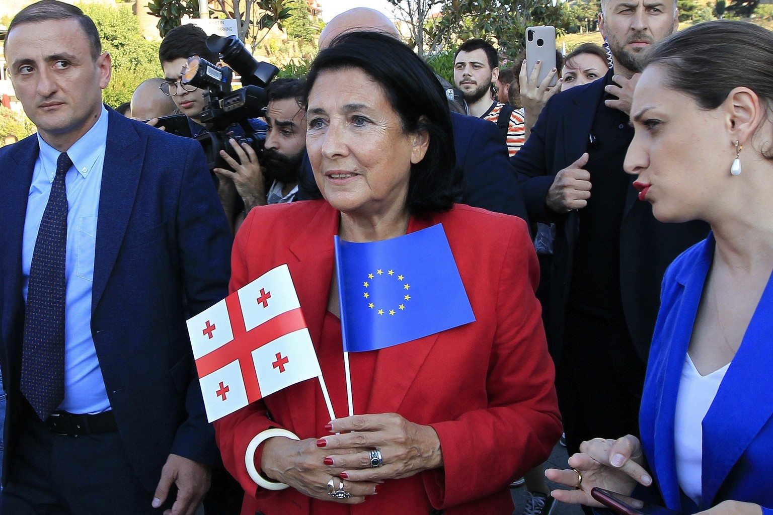 FILE - Georgian President Salome Zourabichvili, center, attends a public rally in support of Georgia&#039;s EU aspirations in Tbilisi, Georgia, on June 16, 2022. The party that dominates the parliamen ...