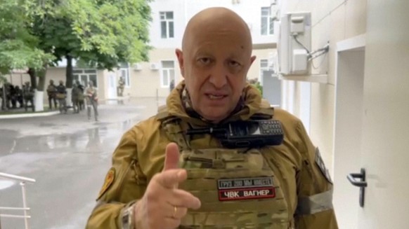 In this handout photo taken from video released by Prigozhin Press Service, Yevgeny Prigozhin, the owner of the Wagner Group military company, records his video addresses in Rostov-on-Don, Russia, Sat ...