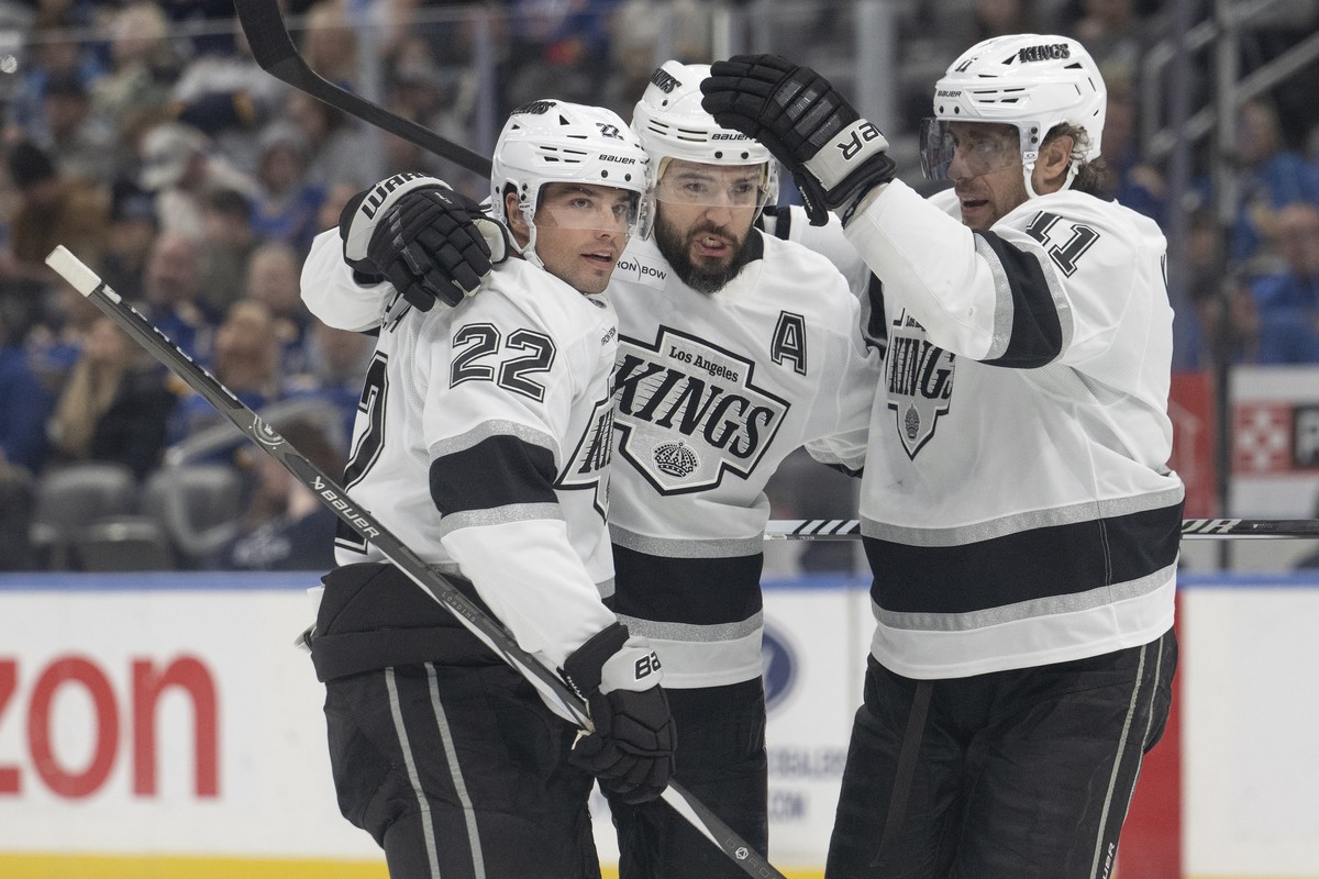 Los Angeles Kings' Kevin Fiala (22), Drew Doughty (8) and Anze Kopitar (11) celebrate a goal against the St. Louis Blues during the first period of an NHL hockey game on Saturday, March 1, 2025,  ...