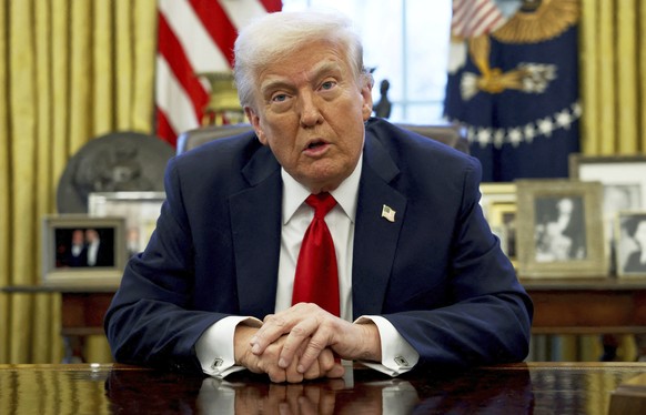 President Donald Trump speaks to reporters in the Oval Office at the White House in Washington, Wednesday, March 26, 2025. (Pool via AP)
Trump