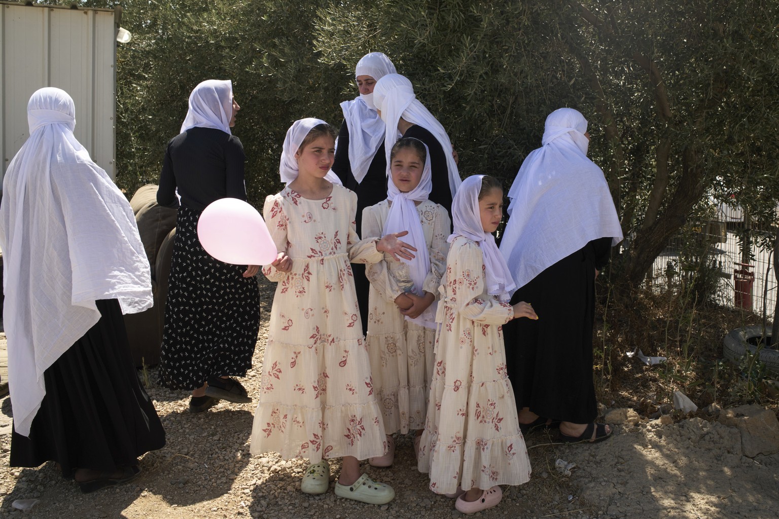Druze women from Syria gather to cross back into Syria at the Israeli-Syrian border, in the Israeli-controlled Golan Heights town of Majdal Shams, Thursday, July 17, 2025. (AP Photo/Leo Correa)
Israel ...