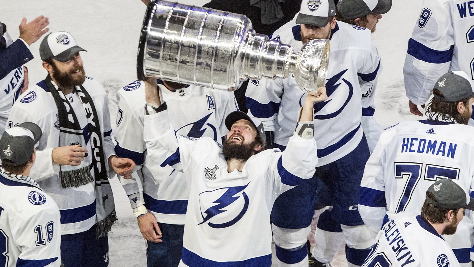 FILE - In this Sept. 28, 2020, file photo, Tampa Bay Lightning's Nikita Kucherov (86) hoists the Stanley Cup after defeating the Dallas Stars in the NHL Stanley Cup hockey finals in Edmonton, Alb ...