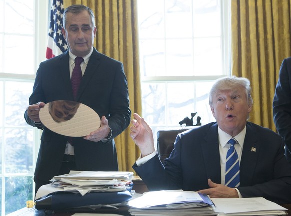 epa05778786 US President Donald J. Trump speaks during a meeting with Intel CEO Brian Krzanich at The White House in Washington, DC, USA, 08 February 2017, where Intel announced an investment of $7 bi ...