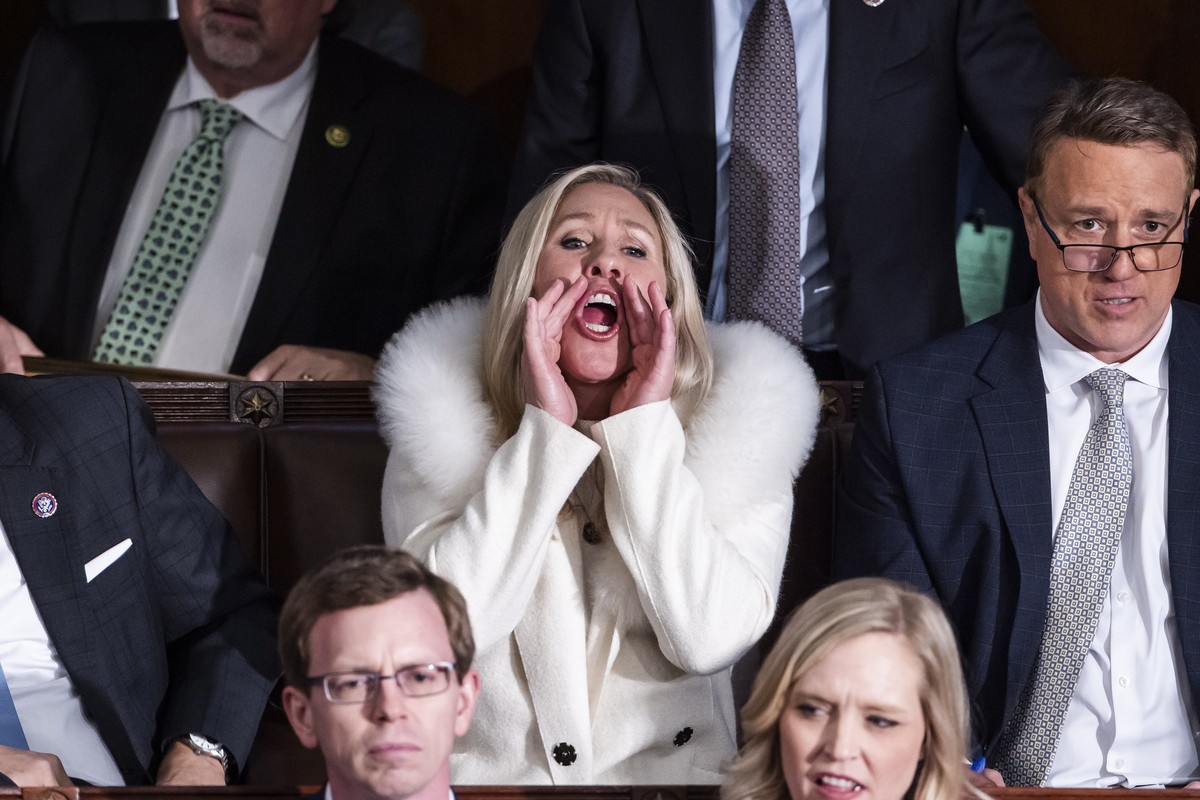 epa10453728 Republican Representative from Georgia Marjorie Taylor Greene shouts 'liar' as US President Joe Biden delivers his State of the Union address before a joint session of Congress i ...