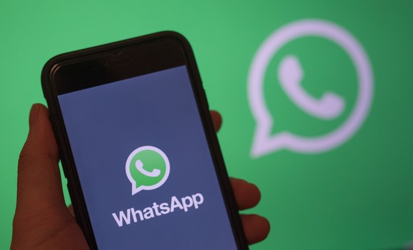 epa08186916 (FILE) - A smartphone screen displays the logo of the mobile application WhatsApp in Berlin, Germany, 31 December 2017 (reissued 02 February 2020). WhatsApp announced that it will stop wor ...