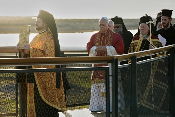 Pope Leo XIV and the Ecumenical Patriarch Bartholomew I, right, lead an Ecumenical prayer service near the archaeological excavations of the ancient Basilica of Saint Neophytos, in Iznik, Turkey, Frid ...