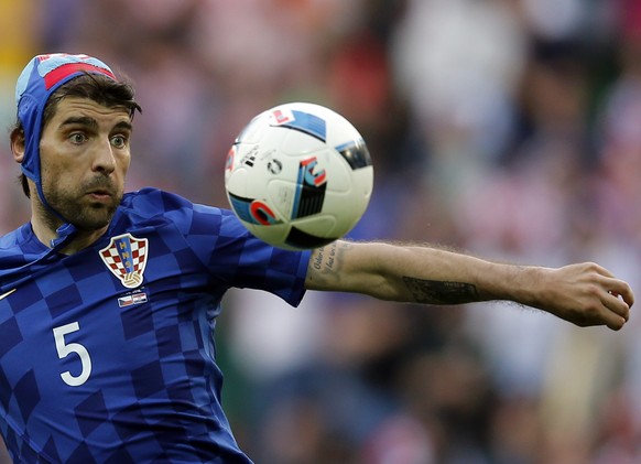 epaselect epa05373379 Vedran Corluka of Croatia in action during the UEFA EURO 2016 group D preliminary round match between the Czech Republic and Croatia at Stade Geoffroy Guichard in Saint-Etienne,  ...