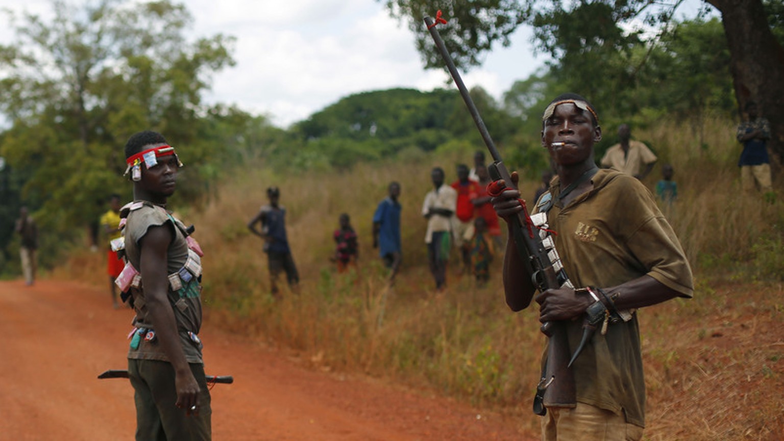 Anti-Balaka Christian militiamen man a mobile checkpoint near Sibut, some 200kms (140 miles) northeast of Bangui, Central African Republic, Friday April 11, 2014. The U.N. Security Council voted unani ...