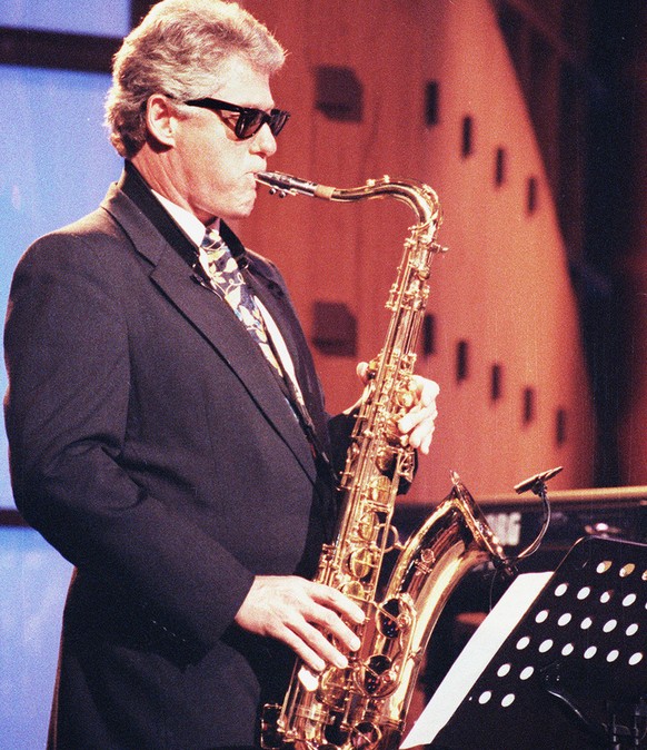 Arkansas Gov. Bill Clinton plays saxaphone on Arsenio Hall&#039;s late-night show in Los Angeles in this June 3, 1992 photo. Once it was rare for Washington bigwigs to risk their dignity for laughs on ...