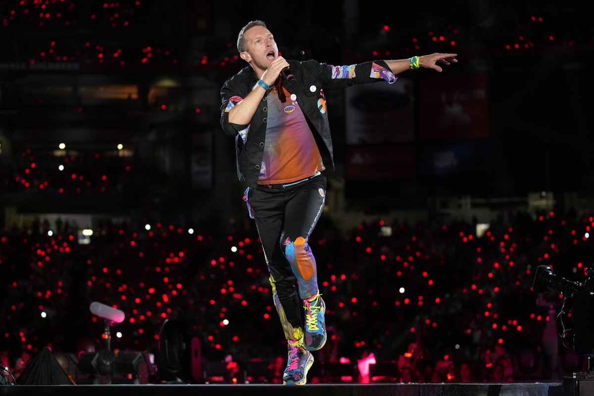 Chris Martin of Coldplay performs during the band's Music of the Spheres world tour on Thursday, May 12, 2022, at State Farm Stadium in Glendale, Ariz. (Photo by Rick Scuteri/Invision/AP)
Chris M ...