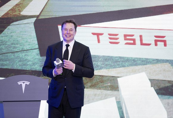 In this photo released by China&#039;s Xinhua News Agency, Tesla CEO Elon Musk speaks at a delivery ceremony for the first Tesla Model 3 cars made at Tesla&#039;s Shanghai factory in Shanghai, Tuesday ...