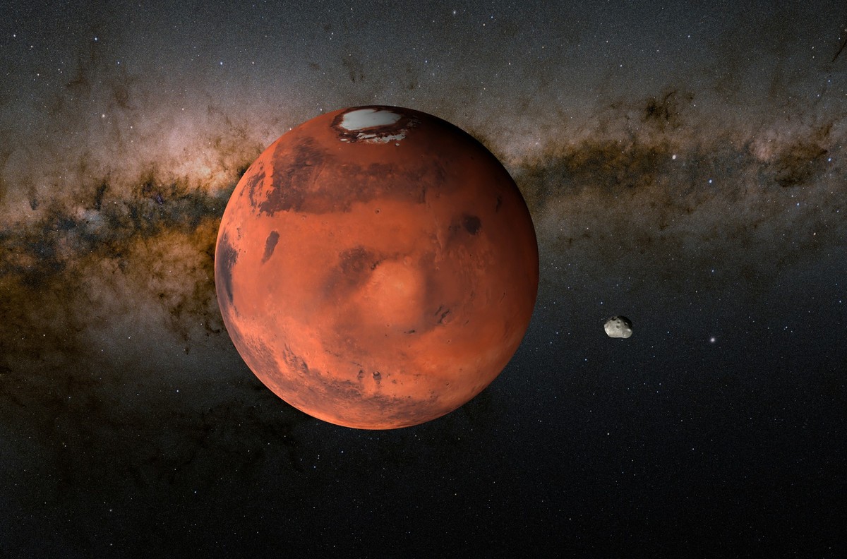 Illustration of Mars (left) and its moon Phobos (right). Phobos is the larger of Mars' two moons, orbiting the planet at a distance of 9,400 kilometres and taking just over 7.6 hours to complete  ...