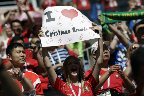 Portugal&#039;s supporters wait for the group B match between Portugal and Morocco at the 2018 soccer World Cup in the Luzhniki Stadium in Moscow, Russia, Wednesday, June 20, 2018. (AP Photo/Matthias  ...