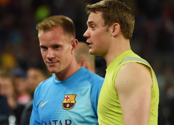BARCELONA, SPAIN - MAY 06: (L-R) Opposing goalkeepers Marc-Andre ter Stegen of Barcelona and Manuel Neuer of Bayern Muenchen walk off the pitch following the final whistle during the UEFA Champions Le ...