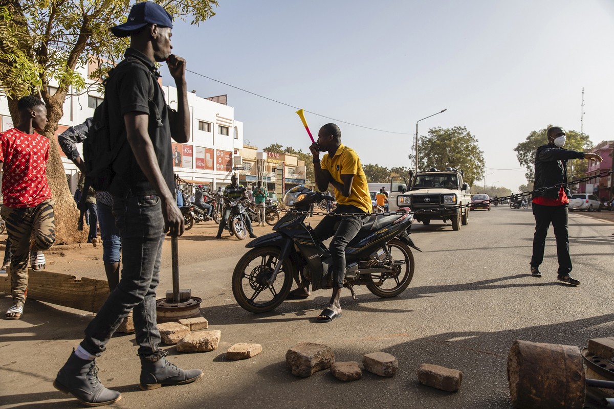 Protestors take to the streets of Burkina Faso's capital Ouagadougou Saturday Jan. 22, 2022, 27, 2021, protesting the government's inability to stop jihadist attacks spreading across the cou ...