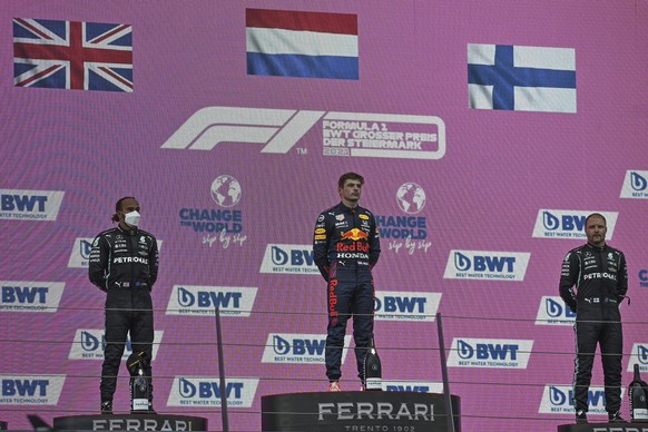 epa09305324 Winner Dutch Formula One driver Max Verstappen (C) of Red Bull Racing, second placed British Formula One driver Lewis Hamilton (L) of Mercedes-AMG Petronas and third Finnish Formula One dr ...