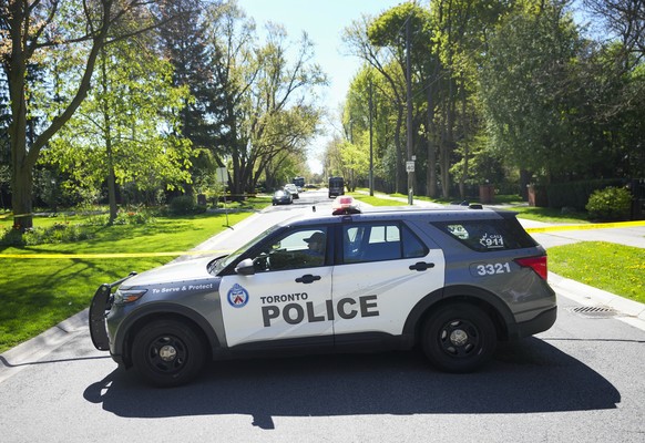 Toronto Police investigate a shooting outside the mansion of rapper Drake in Toronto&#039;s Bridle Path neighborhood, Tuesday, May 7, 2024. Paramedics said a security guard working outside the home wa ...
