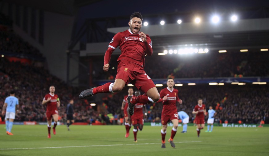 Liverpool&#039;s Alex Oxlade-Chamberlain celebrates after scoring his side&#039;s second goal of the game during the Champions League quarter final, first leg soccer match between Liverpool and Manche ...