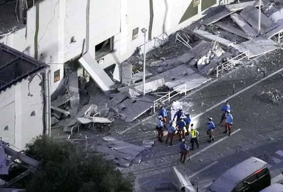This aerial image shows rescue workers continue searching at the damaged AEON Mall after an earthquake in Kashima, Kumamoto prefecture, southern Japan, Tuesday, July 28, 2026. (Kyodo News via AP)
Japa ...