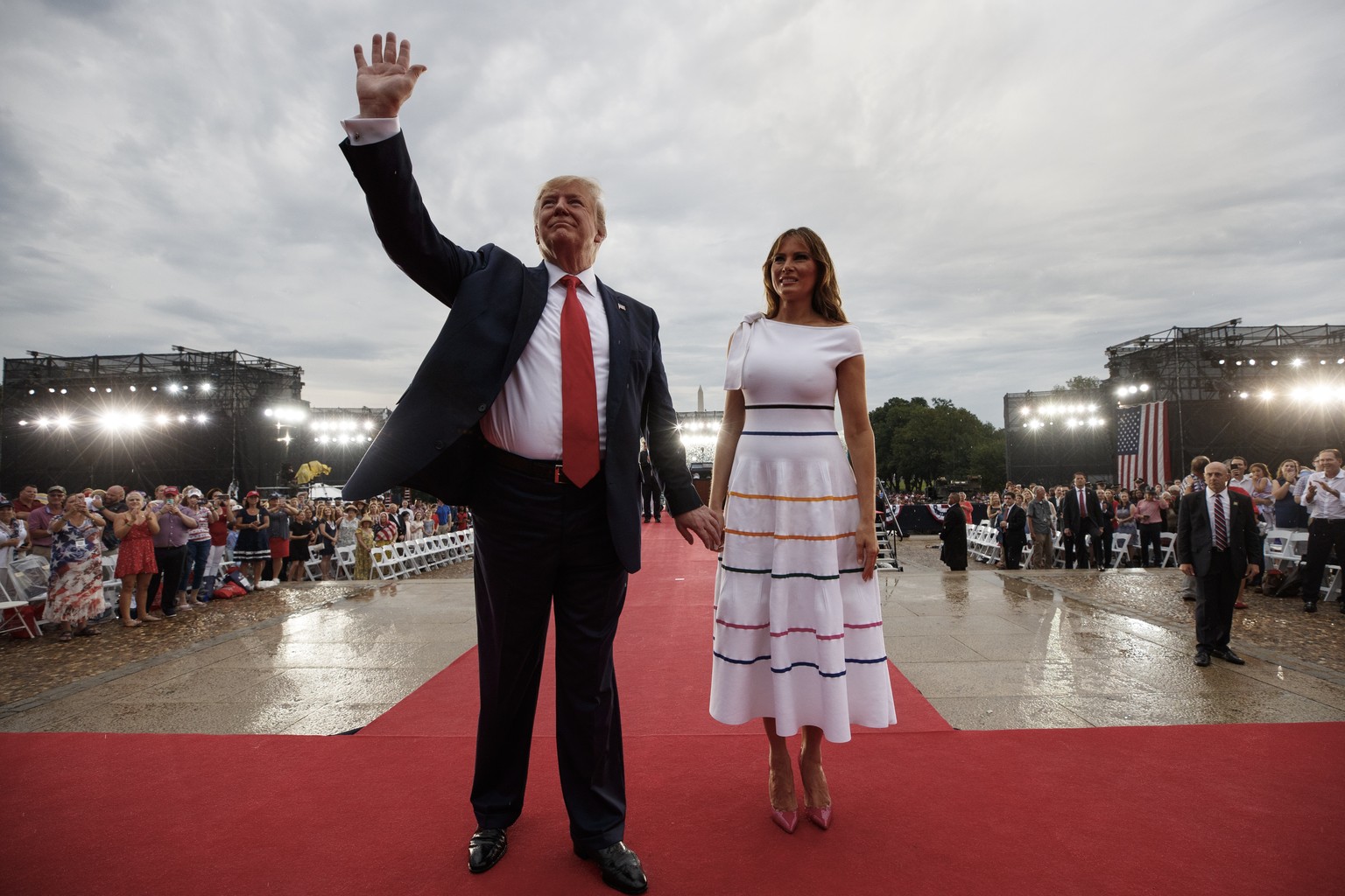 President Donald Trump and first lady Melania Trump leave an Independence Day celebration in front of the Lincoln Memorial, Thursday, July 4, 2019, in Washington. (AP Photo/Carolyn Kaster)
Donald Trum ...