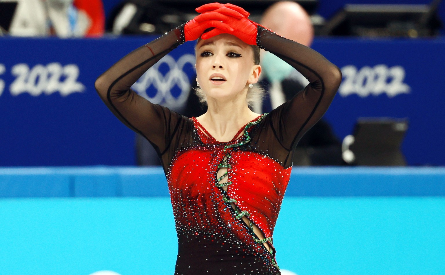 epa09734599 Kamila Valieva of Russia reacts during the Woman Single Skating - Free Skating of the Figure Skating Team Event at the Beijing 2022 Olympic Games, Beijing, China, 07 February 2022. EPA/FAZ ...