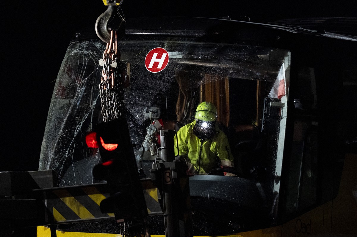 Emergency responders recover a dutch travel coach after an accident in Susch in the canton of Grisons, Switzerland, on Friday, September 11, 2026. Several people died in a tour bus accident on the roa ...