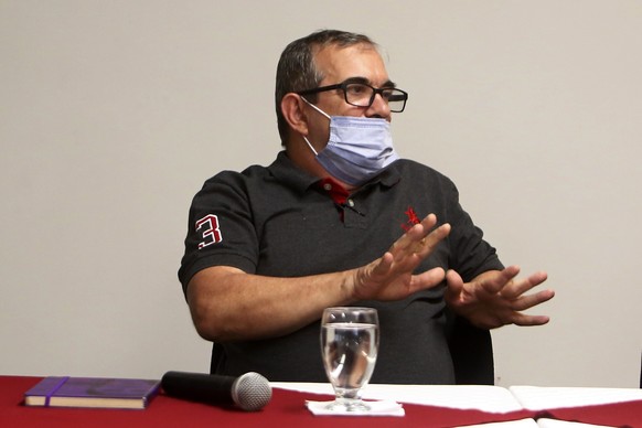 epa08956453 President of the FARC party, Rodrigo Londoño, known in his time as a guerrilla member as &#039;Timochenko&#039;, participates at a press conference to discuss the issues to be discussed at ...