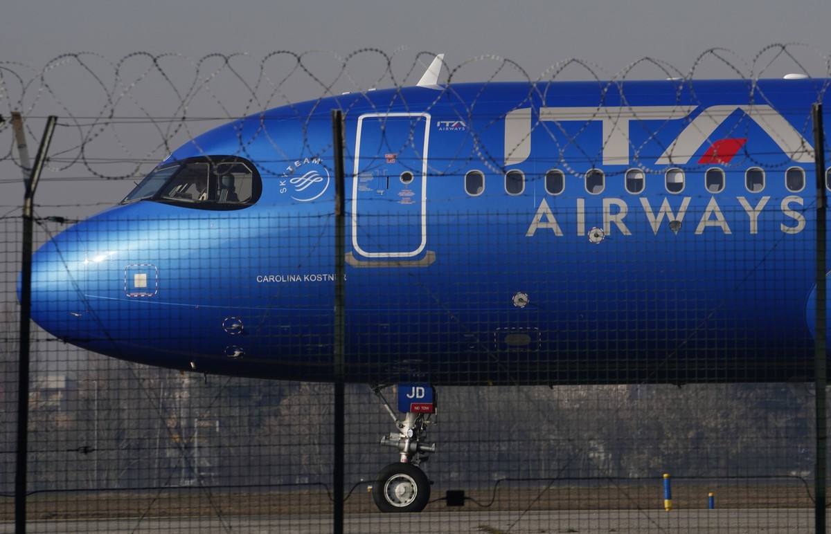 An ITA aircraft stands by on the tarmac before taking off from Linate airport, in Milan, Italy, Wednesday, Jan. 24, 2024. The European Commission on Tuesday announced an in-depth investigation of Germ ...