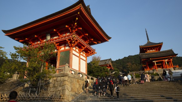 Tourists visit Kiyomizu-dera Buddhist temple in Kyoto, Japan on Thursday Oct. 31, 2019. The temple is a UNESCO World Heritage site and one of Kyoto&#039;s most famous tourist attractions. (AP Photo/Aa ...