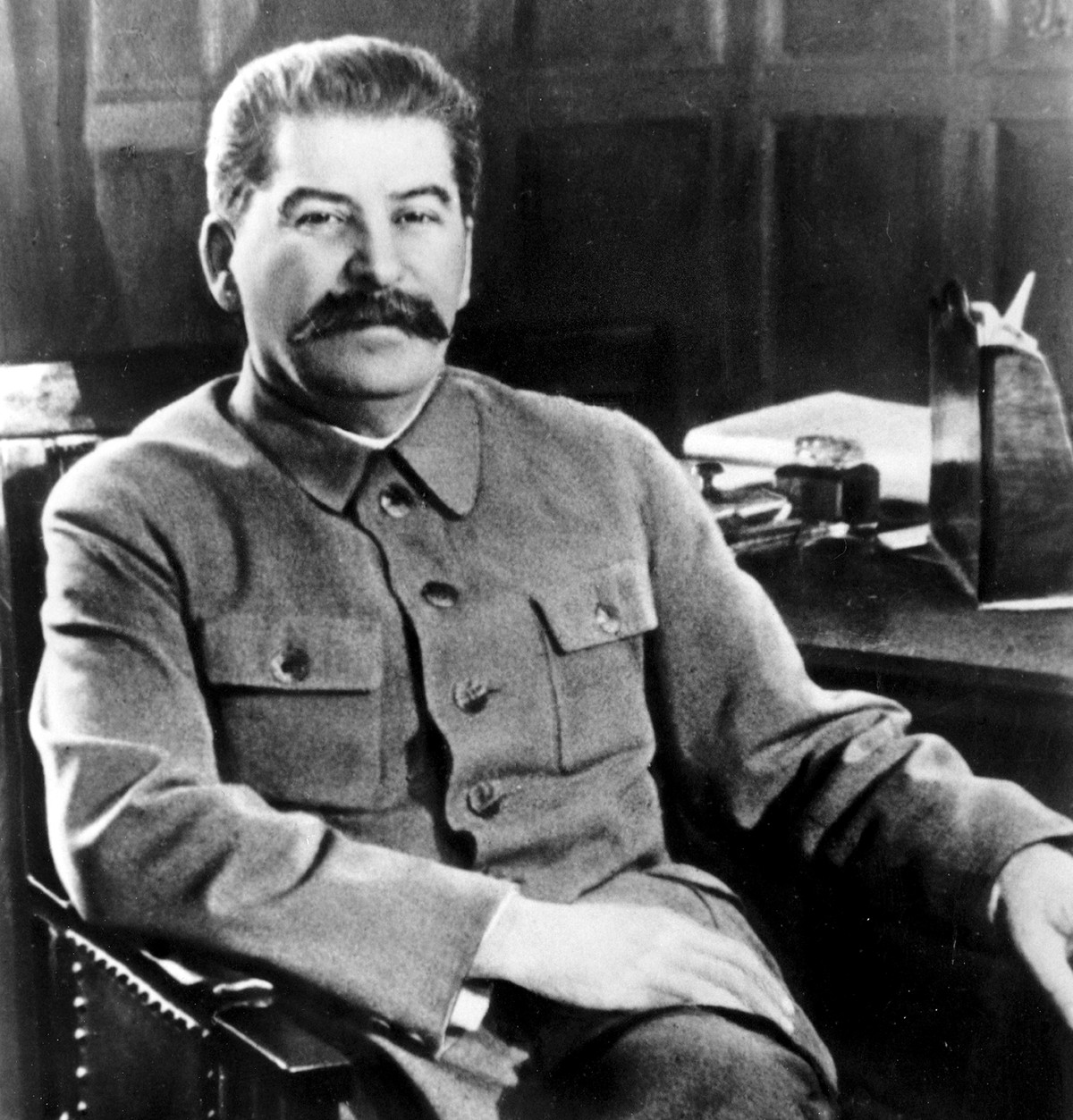 FILE - Josef Stalin, secretary-general of the Communist Party of the Soviet Union and premier of the Soviet state, poses at his desk in the Kremlin, Moscow, Russia in Feb. 1950. Stalin's death fr ...