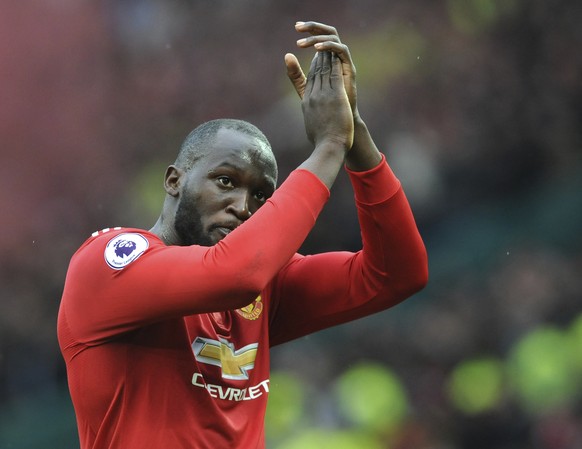 Manchester United&#039;s Romelu Lukaku applauds the fans as he walks from the pitch after the end of the English Premier League soccer match between Manchester United and Liverpool at Old Trafford in  ...