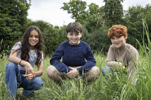 This image released by HBO shows actors, from left, Arabella Stanton, Dominic McLaughlin, and Alastair Stout, who will portray Hermione Granger, Harry Potter and Ron Weasley in the HBO series "Ha ...